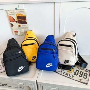 crossbody bags in bigger size with 4 outer zipper pockets & one on the inside